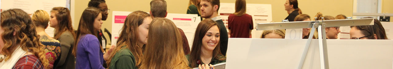 Photo of students in a poster session